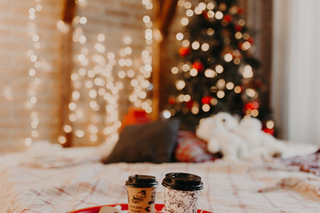 Christmas composition. Gift, fir tree branches and christmas tree balls on white wood background. Winter, new year concept.の写真素材