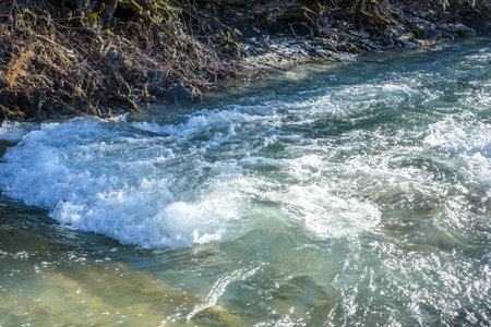 Waterfall on Zhane river on sunny winter day. Krasnodar Krai, Gelendzhik, Russia.