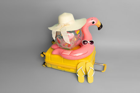 Beach accessories isolated on gray background. Travel and vacation concept.の写真素材