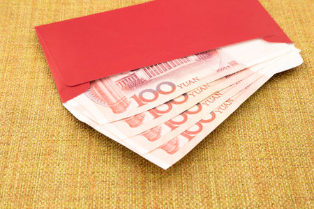 money yuan cash banknote and red envelope, celebrate chinese new year and asian cultureの写真素材