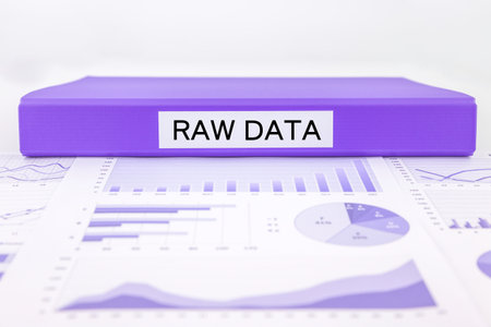 Purple document binder with RAW DATA word place on graphs, charts and research reportの写真素材