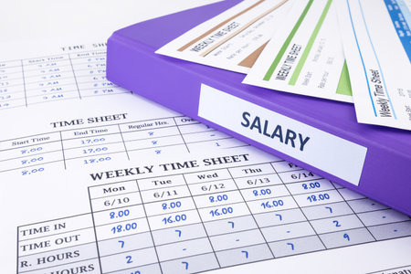 Employee time sheet and salary binder for human resourcesの写真素材