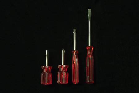 Set of screwdrivers isolated on a black backgroundの写真素材
