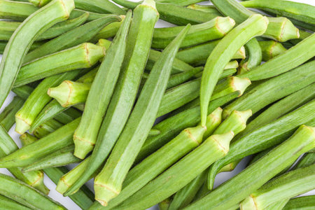 Organic Okra ladyfinger on a white backgroundの写真素材