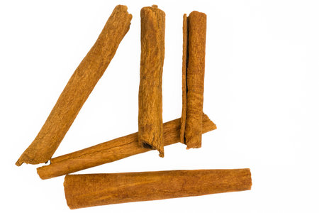 Cinnamon sticks on white background