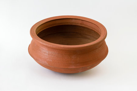 Red unglazed earthenware on a white backgroundの写真素材