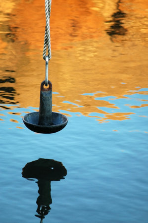 Mushroom anchor used as a counterweight at a pier in Mattapoisett, MAの写真素材