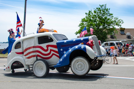 BRISTOL, RHODE ISLAND - JULY 4, 2011: Doing wheelies in the Fourth of July parade in Bristol, Rhode Island, an annual tradition since 1785のeditorial素材