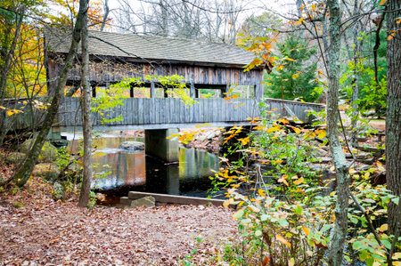 Covered bridge crosses stream at Devil's Hopyard State Park in East Haddam, Connecticut