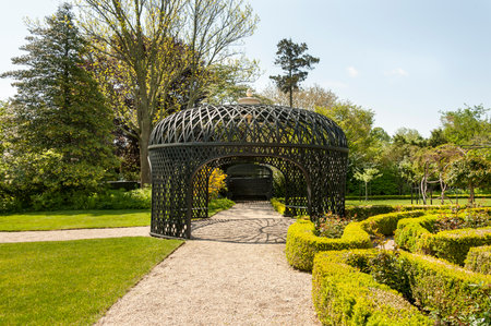 New Bedford, Massachusetts, USA - May 25, 2016: Victorian-style pergola at the heart of the ornamental gardens at the Rotch-Jones-Duff House in New Bedford, Massachusettsのeditorial素材