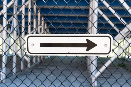 Black arrow indicating traffic flow at football stadiumの写真素材