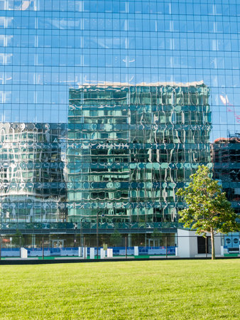 Boston, Massachusetts, USA - July 24, 2016: Building reflects wildly distorted image of nearby buildingのeditorial素材