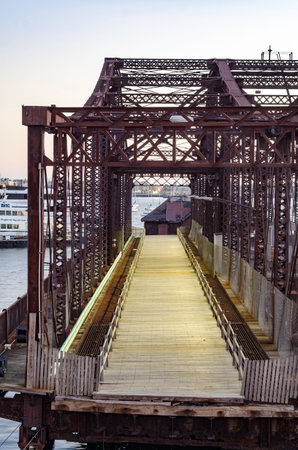 Boston, Massachusetts, USA - October 20, 2016: Decrepit Northern Avenue Bridge between Boston and South Boston positioned to prevent use while its future is decidedのeditorial素材