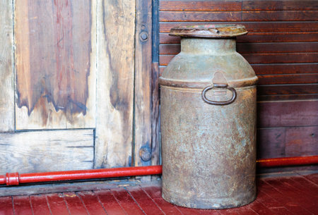 Portland, Maine, USA - August 10, 2009: Old milk can displayed at Maine Narrow Gauge Railroad Co & Museumのeditorial素材