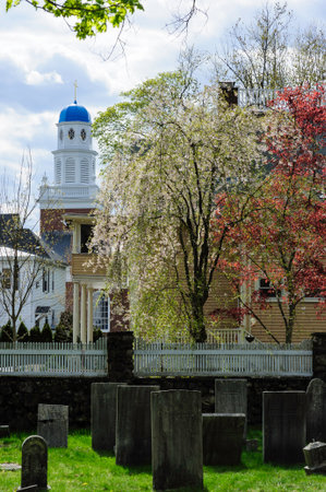Lexington, Massachusetts, USA - April 20, 2010: Old Burying Ground in Lexington, Massachusetts with St. Brigid Parish in backgroundのeditorial素材