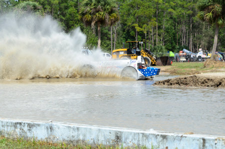 Naples, Florida, USA - March 3, 2012: High-powered swamp creates big rooster tail
