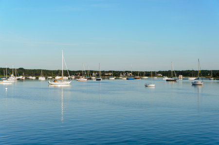 Dartmouth, Massachusetts, USA - August 30, 2014: Boats in Apponagansett Bay on still summer morning