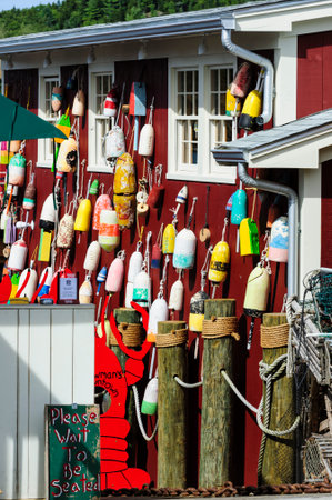 Bar Harbor, Maine, USA - September 12, 2010: Colorful floats decorate Bar Harbor waterfront restaurantのeditorial素材