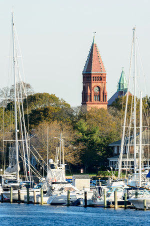 Fairhaven, Massachusetts, USA - November 4, 2017: Clock tower of town hall rises above marina on Acushnet River in Fairhaven, Massachusettsのeditorial素材