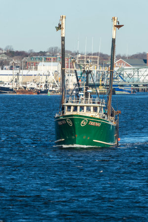New Bedford, Massachusetts, USA - January 19, 2018: Trawler Trifuno leaving New Bedford harbor