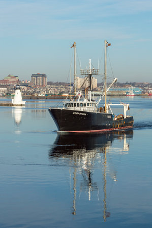New Bedford, Massachusetts, USA - February 19, 2018: Commercial fishing vessel Edgartown leaving New...