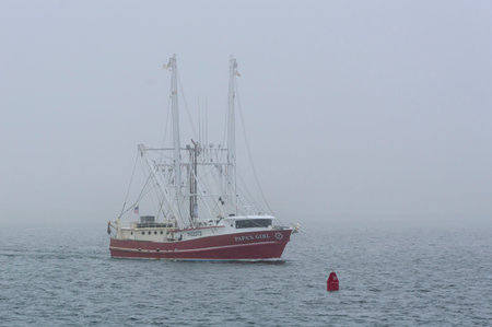 New Bedford, Massachusetts, USA - February 20, 2018: Commercial fishing vessel Papa's Girl, hailing...