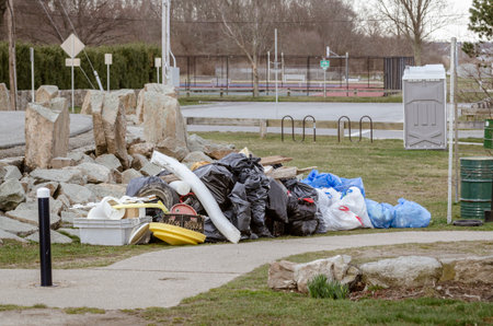 Mound of trash collected by volunteers along Fort Phoenix shoreline in Fairhaven, Massachusetts
