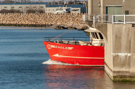 New Bedford, Massachusetts, USA - January 25, 2019: Bow of commercial fishing vessel Eagle emerging...