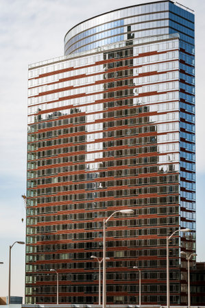 New York, New York, USA - February 1, 2009: Glass-fronted building reflecting adjacent building