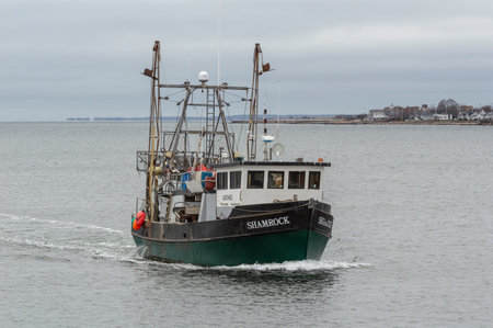 New Bedford, Massachusetts, USA - April 9, 2019: Commercial fishing vessel Shamrock returning to New...