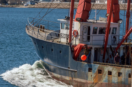New Bedford, Massachusetts, USA - April 11, 2019: Commercial fishing vessel Friendship as she...