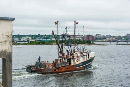 New Bedford, Massachusetts, USA - June 26, 2019: Commercial fishing vessel Tom Slaughter II, hailing...