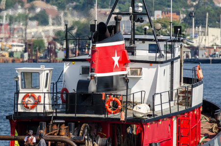 New Bedford, Massachusetts, USA - August 2, 2019: Tug Morgan crossing New Bedford inner harborのeditorial素材