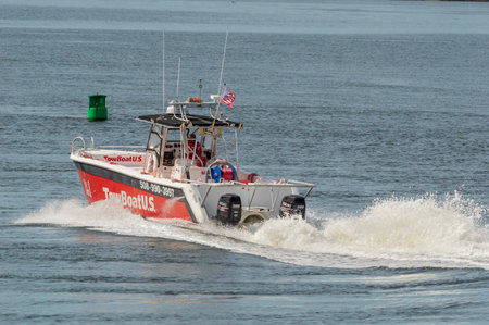 Fairhaven, Massachusetts, USA - July 16, 2019: Commercial towboat heading toward Buzzards Bay on Acushnet Riverのeditorial素材