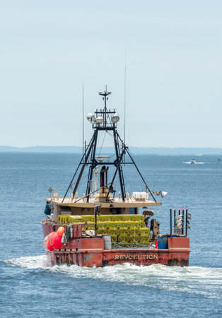 New Bedford, Massachusetts, USA - June 17, 2019: Lobster boat Revolution heading out of New Bedford...
