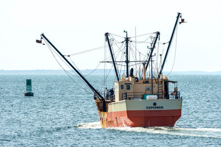 New Bedford, Massachusetts, USA - May 8, 2019: Eastern rig fishing vessel Explorer beginning to...