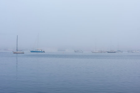 New Bedford, Massachusetts, USA â September 22, 2019: Recreational boats moored in New Bedford inner harbor on foggy morningのeditorial素材