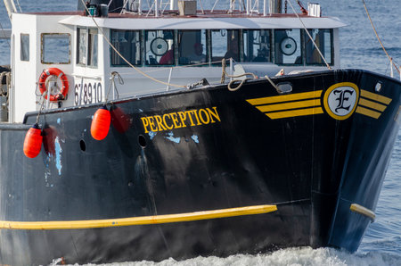 New Bedford, Massachusetts, USA â€“ August 4, 2019: Commercial fishing boat Perception nearing...