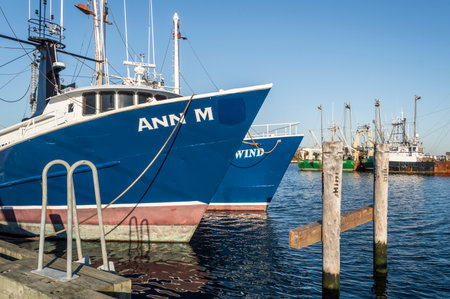 Fairhaven, Massachusetts, USA - November 3, 2019: Commercial fishing boats Ann M and Fair Wind docked in Fairhaven in early morningのeditorial素材