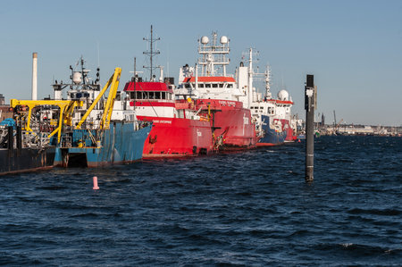 New Bedford, Massachusetts, USA - November 16, 2019: String of survey vessels (L-R)--R/V Shearwater, Fugro Enterprise, Fugro Searcher, Kommandor Iona, and Fugro Discovery docked at the Marine Commerce Terminalのeditorial素材