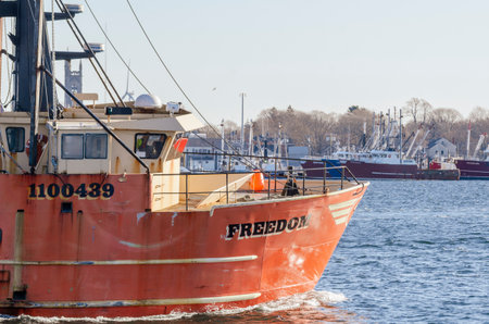 New Bedford, Massachusetts, USA - November 30, 2019: Commercial fishing boat Freedom sweeping past State Pier on sea trialのeditorial素材