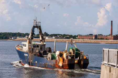 New Bedford, Massachusetts, USA - August 4, 2019: Dragger Nobska transiting New Bedford hurricane...