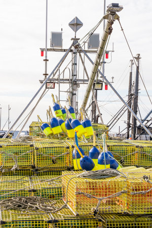 Fairhaven, Massachusetts, USA - March 14, 2020: Traps and floats loaded aboard lobster boat Intimidatorのeditorial素材