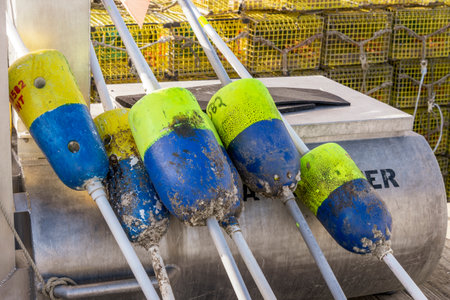 Fairhaven, Massachusetts, USA - March 15, 2020: Floats stacked for cleanup on Fairhaven dock