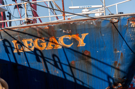 Fairhaven, Massachusetts, USA - June 23, 2019: Bow of commercial fishing boat Legacy  showing battle...