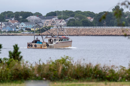 New Bedford, Massachusetts, USA - August 21, 2018: Seen from Fort Phoenix in Fairhaven, commercial fishing vessel Endurance approaching New Bedford from Buzzards Bayのeditorial素材