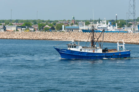 New Bedford, Massachusetts, USA - May 29, 2018: Commercial fishing vessel Sentinel with hurricane...