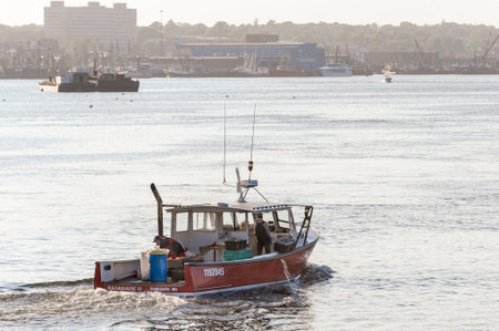 Fairhaven, Massachusetts, USA - May 29, 2018: Lobster boat Renegade II homebound on the Acushnet River in early eveningのeditorial素材