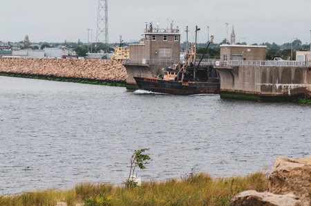 New Bedford, Massachusetts, USA - September 3, 2018: Commercial fishing vessel Hustler, transiting...