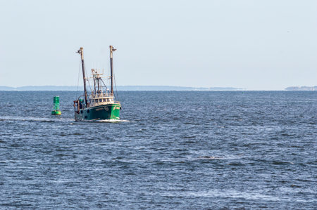 New Bedford, Massachusetts, USA - September 2, 2018: Commercial fishing boat Triunfo coming out of Buzzards Bay on her way into New Bedfordのeditorial素材